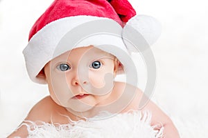 Cute newborn baby in christmas hat