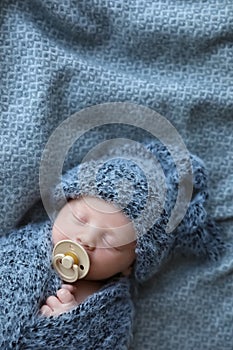 Cute newborn baby sleeping on blanket. Space for text