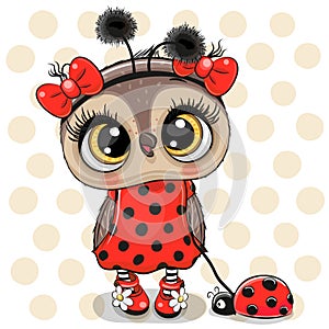 Cute Owl girl in a ladybug costume and ladybug photo