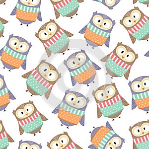 Cute owls in the winter clothes seamless pattern
