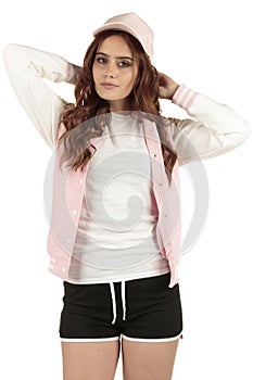 Cute pastel pink retro sporting fashion model wearing a blank white shirt to display your design