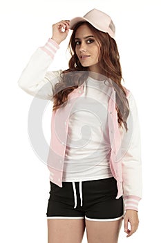 Cute pastel pink retro sporting fashion model wearing a blank white shirt to display your design