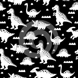 Cute pattern with dinosaurs on black backgrond.