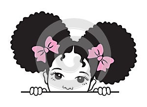 Cute Peekaboo Girl with Afro Puff Hair photo