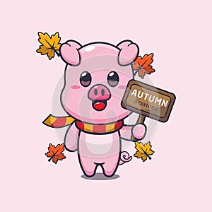 Cute pig with autumn sign board.