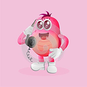 Cute pink monster pick up the phone, answering phone calls