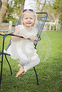 Cute Playful Baby Girl Portrait Outside at Park