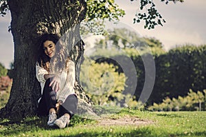 Cute and playful woman having a good mood in nature