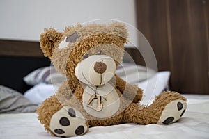 Teddy bear on the bed. Slovakia