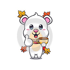 Cute polar bear with coffee in autumn season.