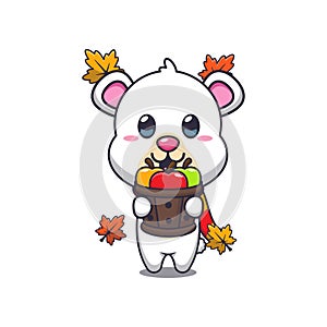 Cute polar bear holding a apple in wood bucket.