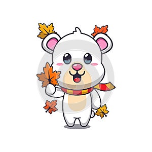 Cute polar bear holding autumn leaf.