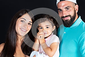 Cute portrait family mother daugter and arabic father