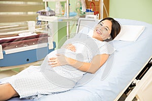 Cute pregnant woman in a hospital