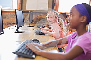 Cute pupils in computer class