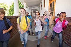 Cute pupils running down the hall