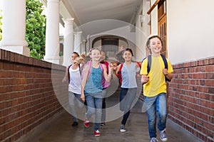 Cute pupils running down the hall