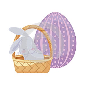 Cute rabbit with basket wicker and egg of easter