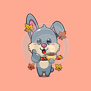 Cute rabbit with coffee in autumn season.