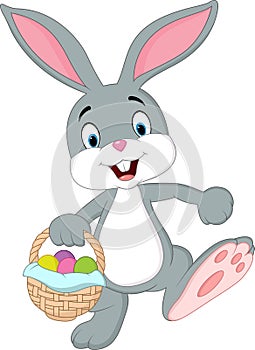 Cute rabbit holding easter basket