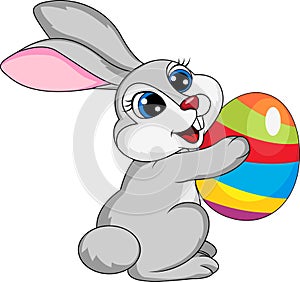 Cute rabbit holding ester egg