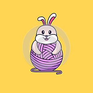 Cute rabbit playing with wool yarn. Animal cartoon concept isolated. Can used for t-shirt, greeting card, invitation card or