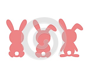 Cute rabbit with tail sitting back. Vector illustration lovely stylized bunny silhouette isolated on white. Easter