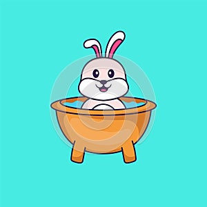 Cute rabbit taking a bath in the bathtub. Animal cartoon concept isolated. Can used for t-shirt, greeting card, invitation card or