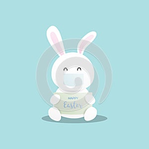 Cute rabbit wearing facemask on blue background