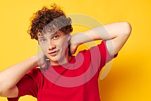 cute red-haired guy red t shirt fun posing casual wear  background unaltered
