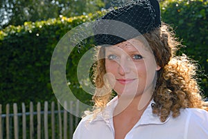 Cute redhead in fifties pillbox hat