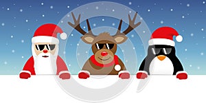Cute reindeer santa claus and penguin cartoon with sunglasses for christmas