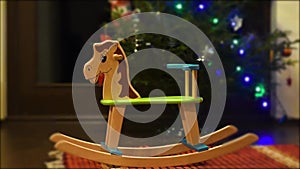 Cute rocking horse chair - good gift for Christmas or New year for the baby from Santa Claus or parents