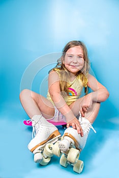 Cute roller girl with quads skates photo