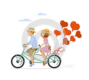 Cute romantic cheerful couple riding tandem bike