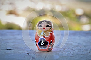 Cute Russian wooden doll matrioska photo