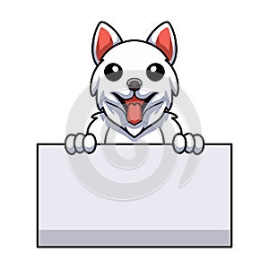 Cute samoyed dog cartoon holding blank sign