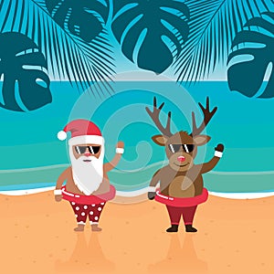 cute santa and deer with sunglasses on paradise beach summer christmas holiday