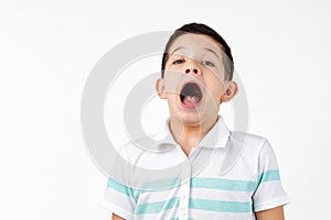 Cute scared little child boy in t-shirt