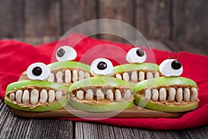 Cute scary halloween apple cyclop monsters food photo