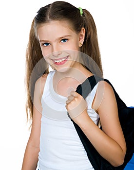 Cute schoolchild with knapsack photo