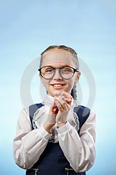 Cute Schoolgirl In Glasses Smile Implore Gesture