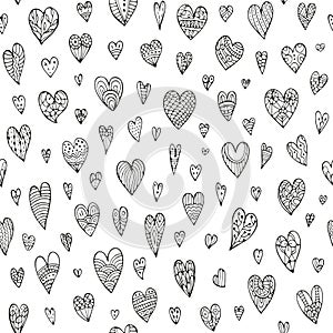 Cute seamless doodle pattern with different hearts.