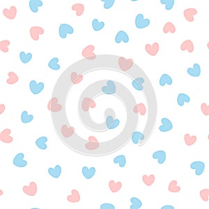 Cute seamless pattern with blue and pink hearts scattered on white background.