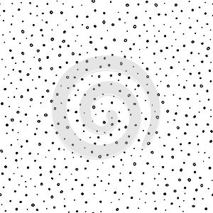 Cute seamless pattern in polka dot style. Black and white abstract print for textiles. Ink dots on a white background. Vector