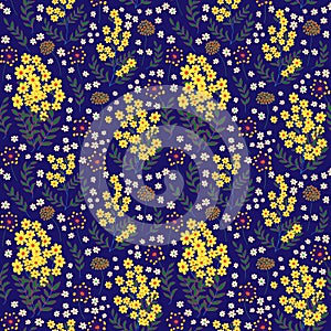 Cute seamless pattern in small flower. Small yellow and white flowers. Dark blue background. Ditsy floral style. Fashion