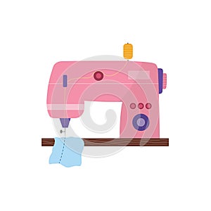 Cute sewing machine in cartoon style. Handmade equipment for dressmaking photo