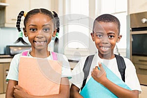 Cute siblings ready for school