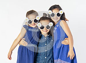 Cute sisters in flower sunglasses