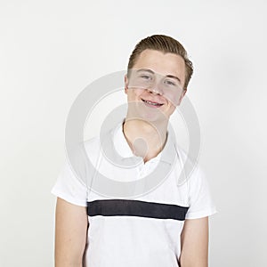 Cute sixteen year old boy in studio